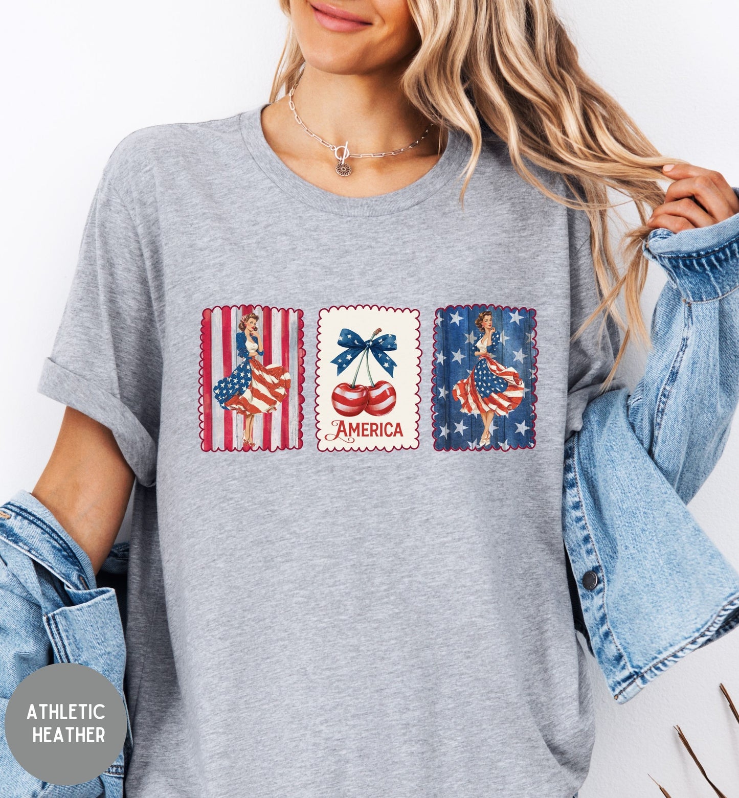 Person wearing a gray t-shirt with patriotic graphics and 'America' text.