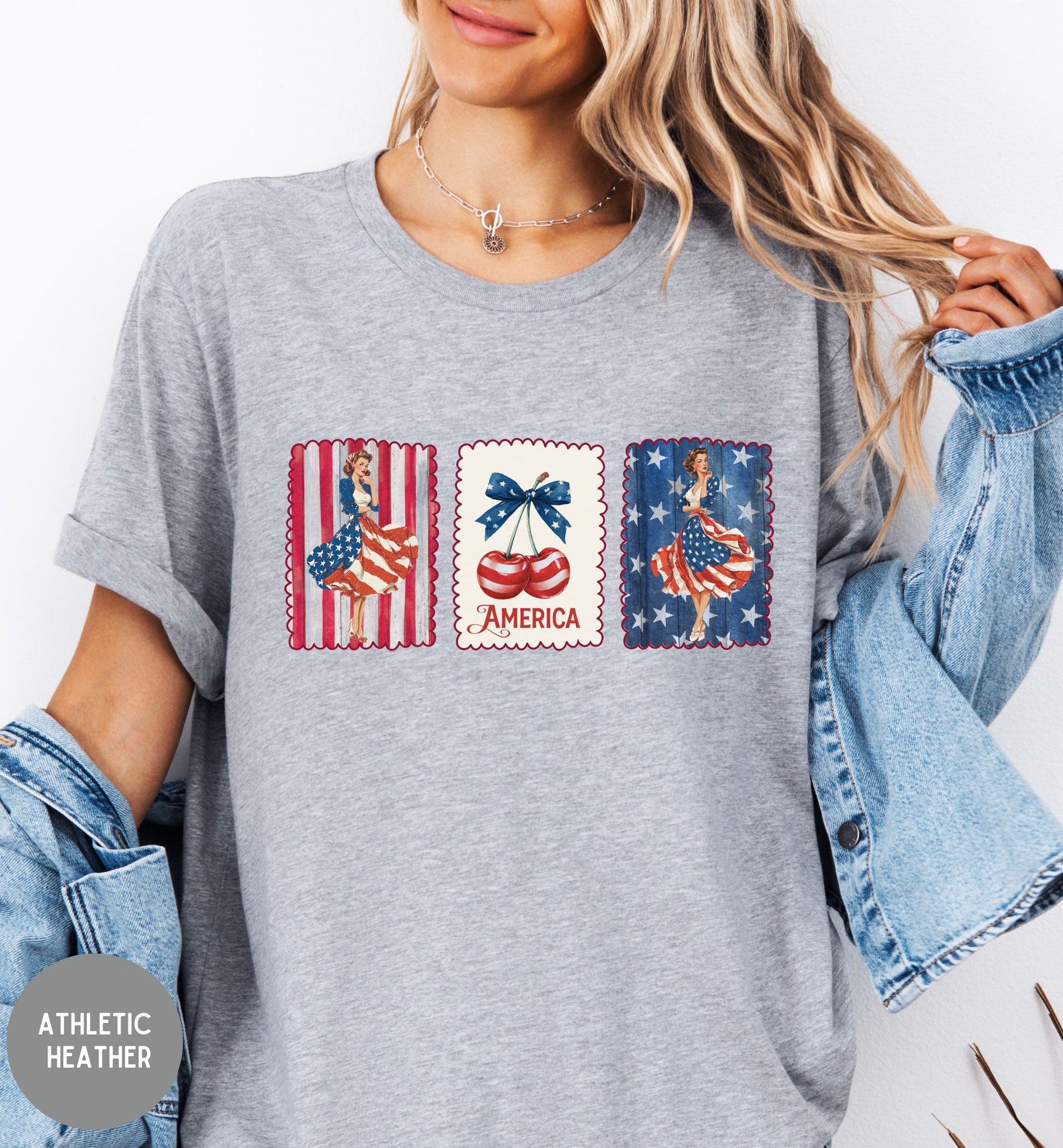 Person wearing a gray t-shirt with patriotic graphics and 'America' text.