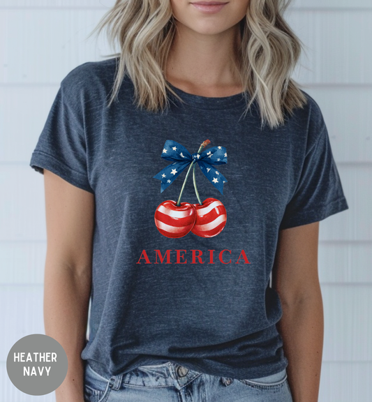 America Patriotic Cherry T-Shirt | Red White Blue Bow Shirt | Fourth of July Tee | Cute USA Graphic Shirt | Vintage Americana Unisex Tee